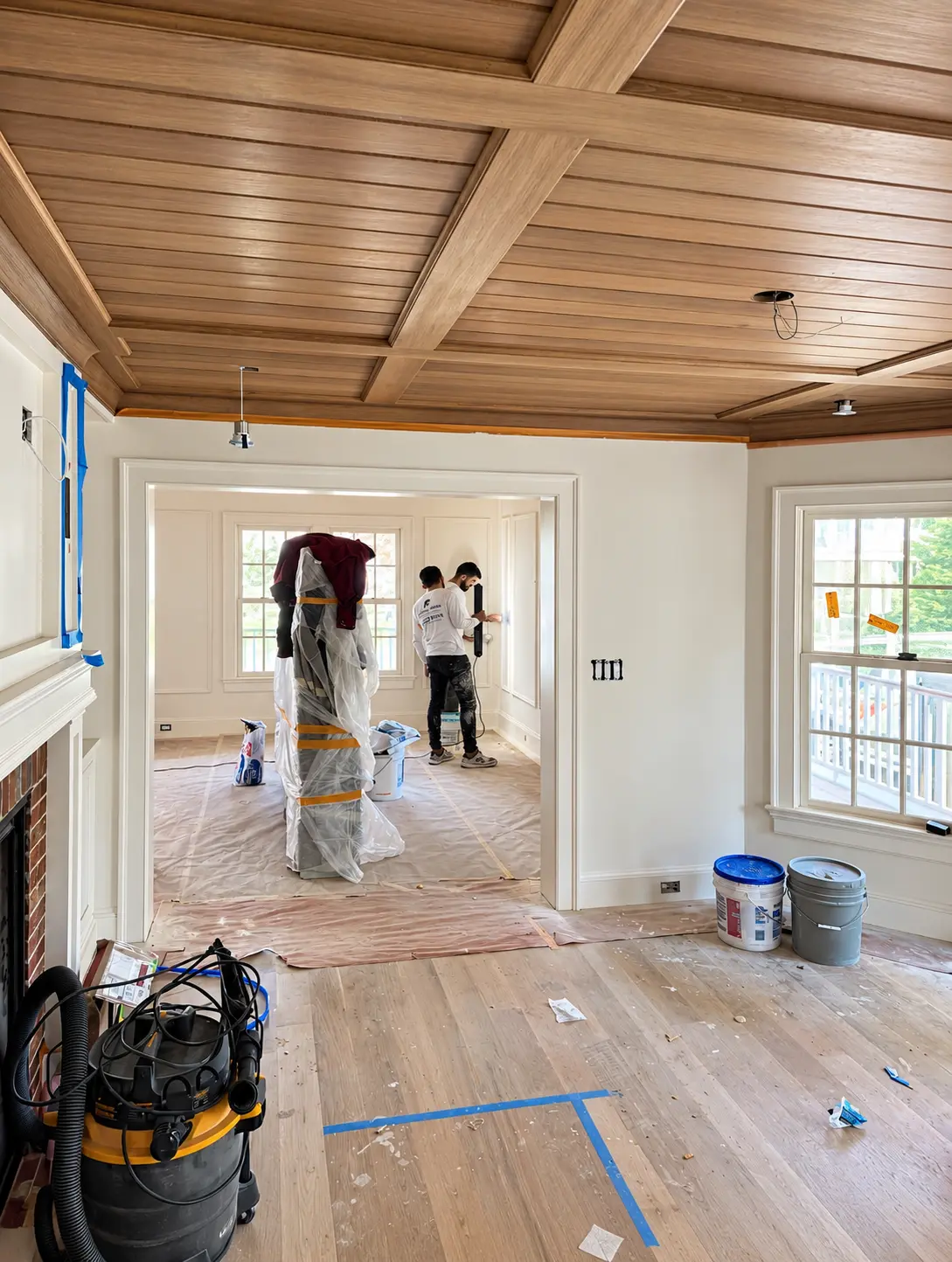 Coffered wood ceiling during finishing work in a protected interior