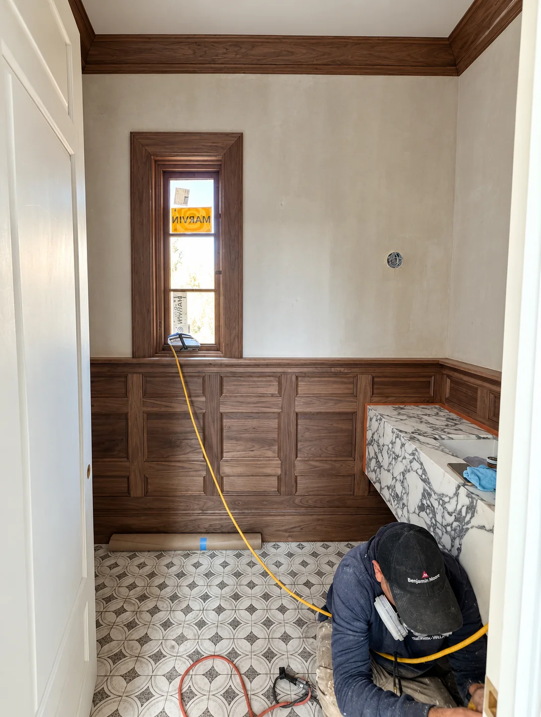 Powder room during new construction painting in Haworth NJ with surrounding finishes protected