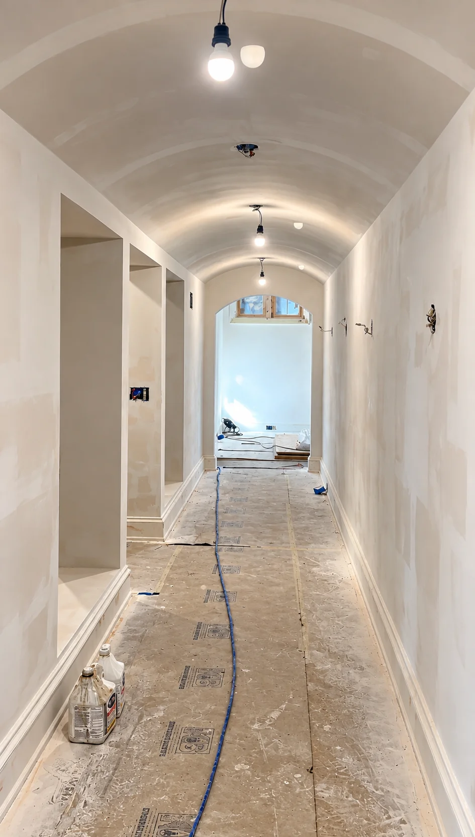 Arched hallway during surface preparation in a Haworth, NJ new home
