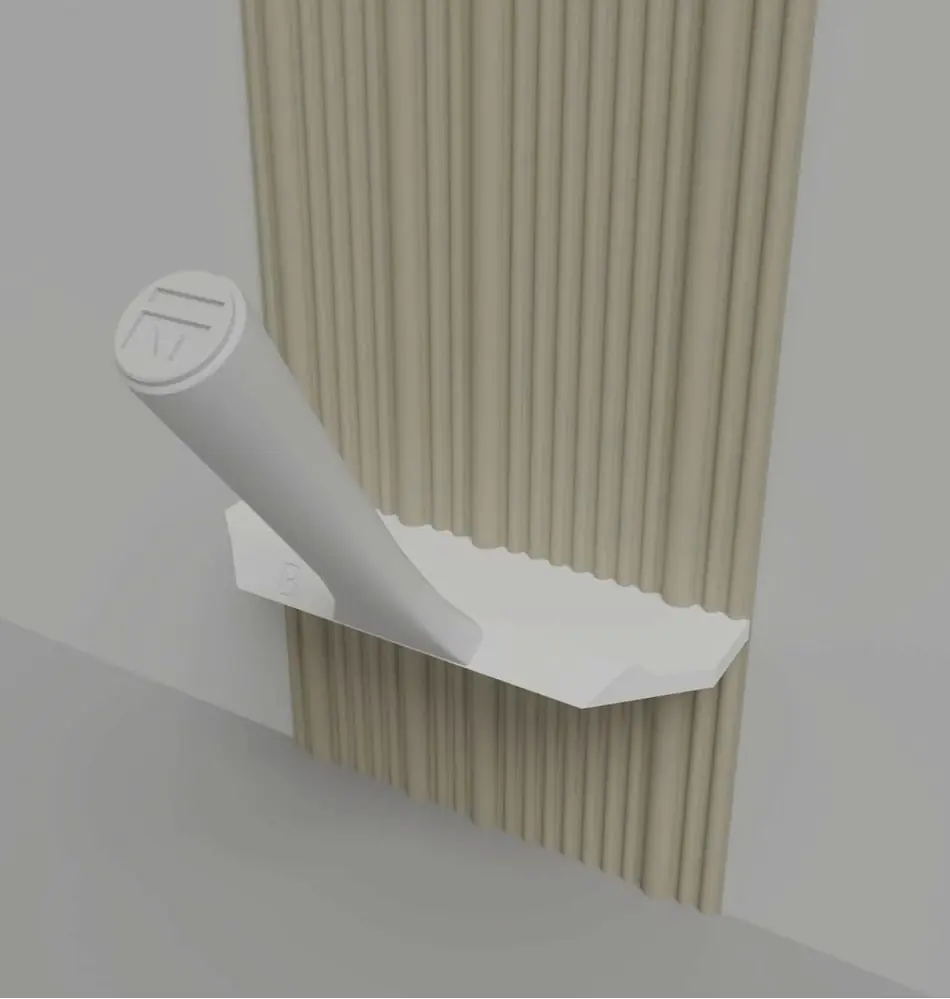 Meoded Fluted Raked White B comb tool used to continue fluted plaster lines from the top down