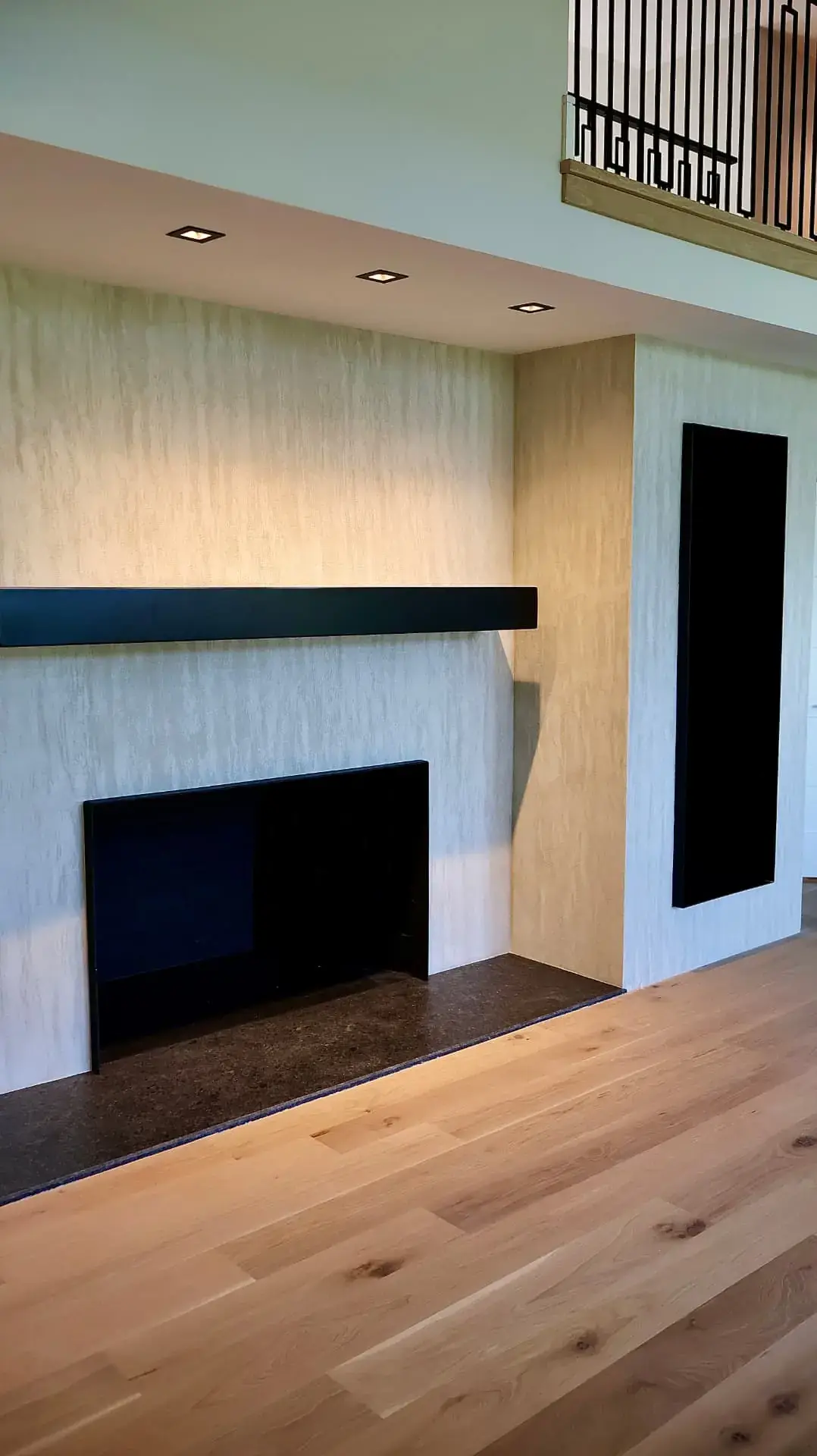 Travertine-inspired Meoded Palladino plaster fireplace in Bernardsville, NJ