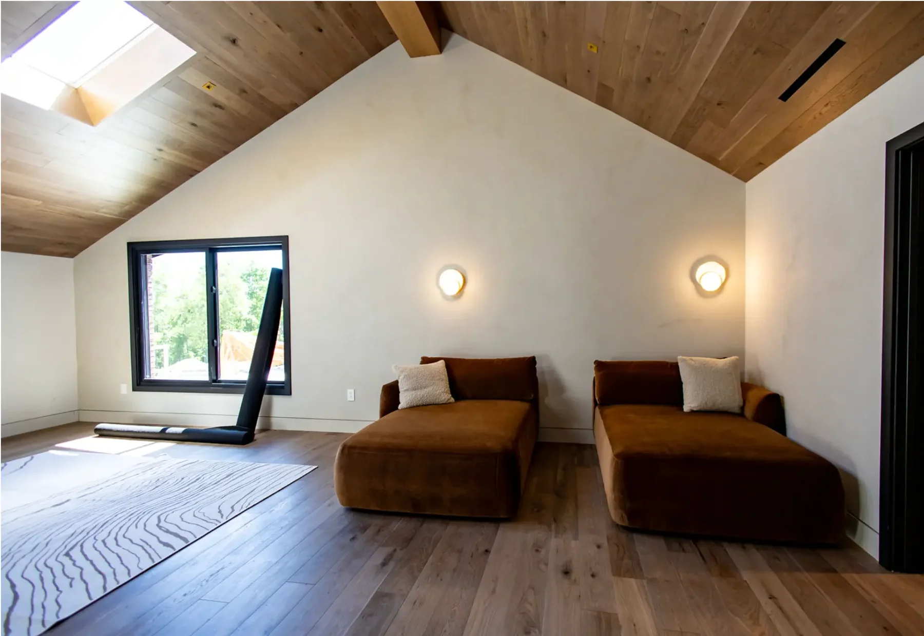 Bedroom nook with wood plank ceiling meeting a plaster ridge in Pompton Plains, NJ