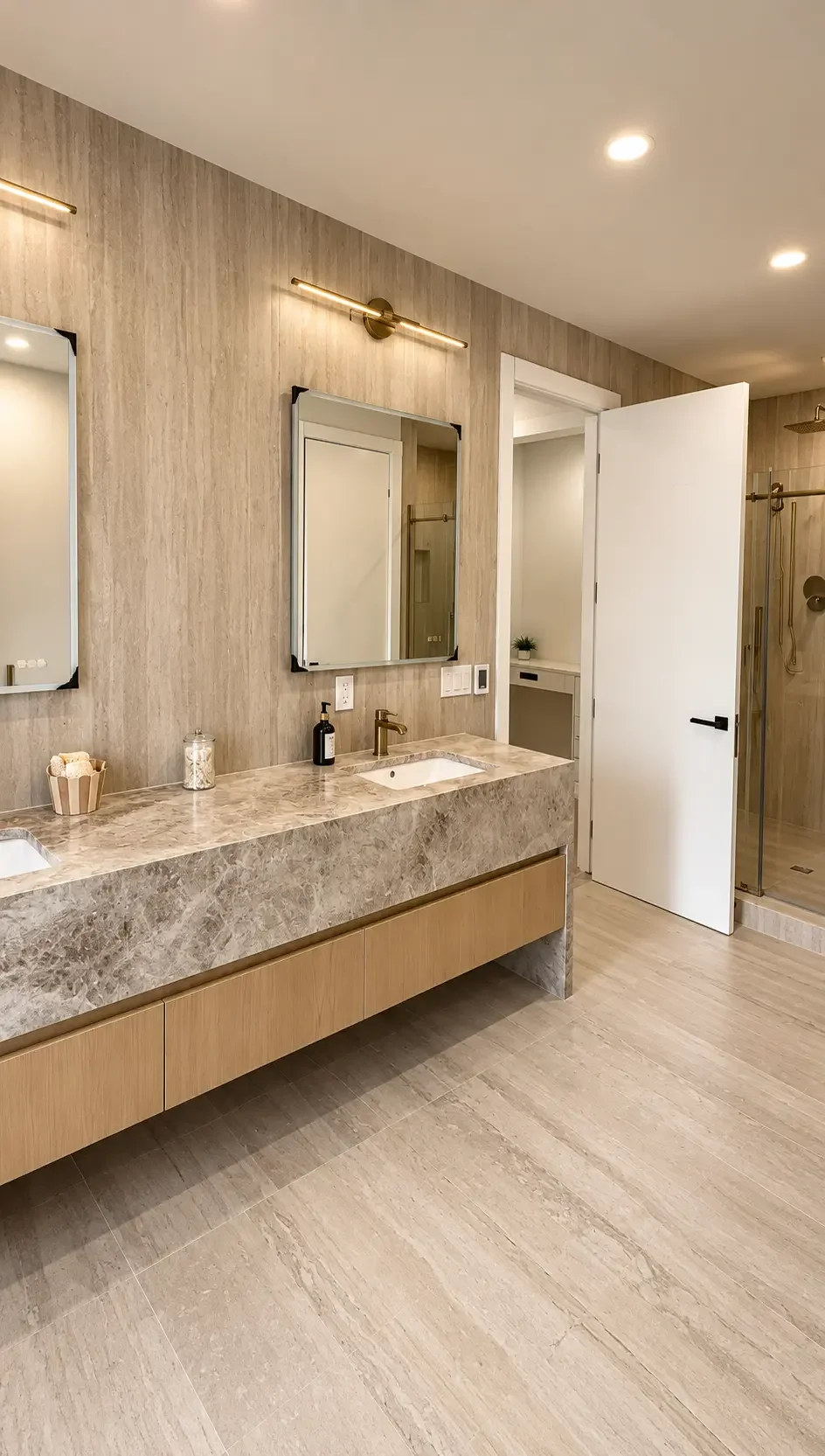 Bathroom vanity with twin mirrors, stone counter and textured wall finish in Paramus, NJ