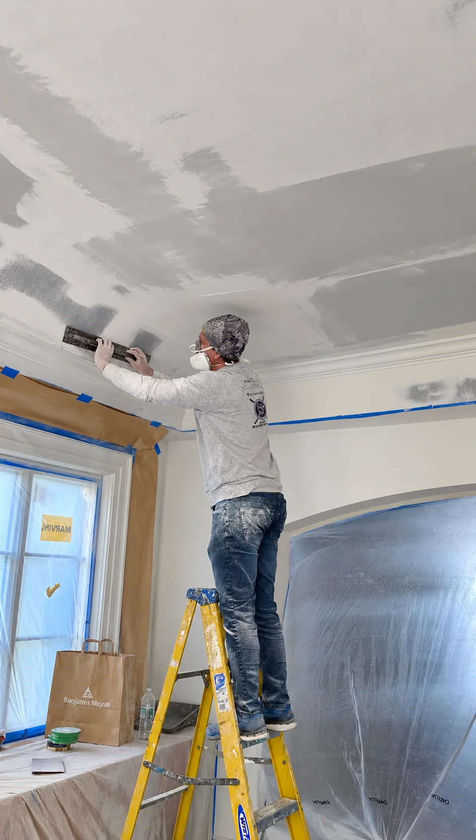 Ceiling surface preparation during new construction painting in Haworth, NJ