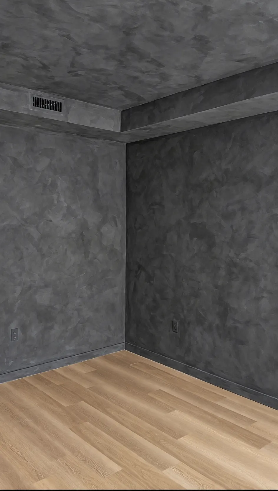 Charcoal limewash walls and ceiling with dramatic hand-brushed movement in a Secaucus, NJ condo